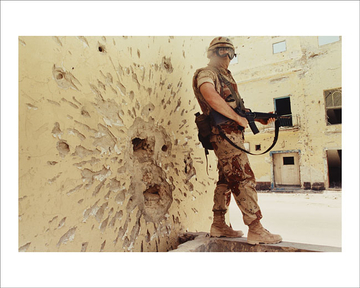 A Marine stands guard